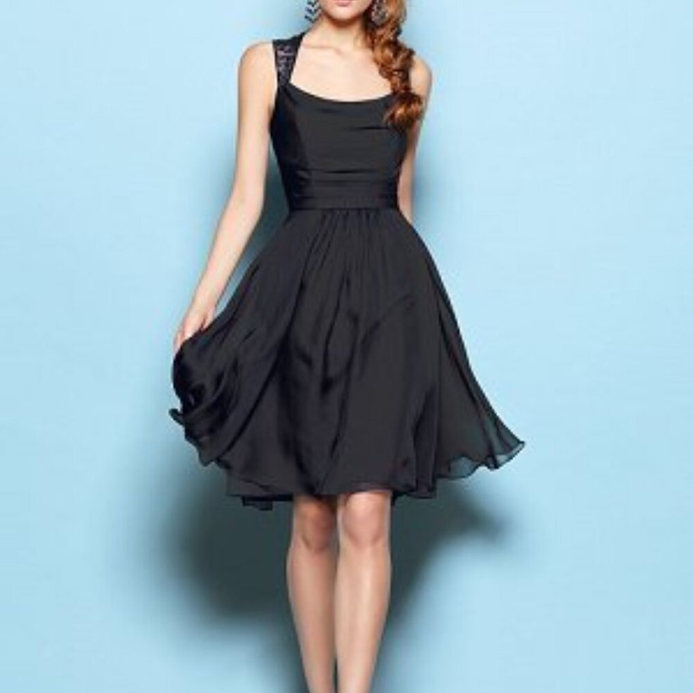 Flowing purple and lace dress perfect for any party guest